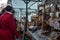 Vendor stall at a Christmas Market selling cakes and sweets with customers