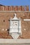 Venetian Arsenal, old shipyard, relief of Lion of Saint Mark on facade, Venice, Italy.