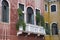 Venetian balcony on colorful house