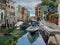 Venetian canal with parked to pavement boats architecture watercolor landscape original illustration