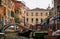 Venetian city canal with gondolas, the bridge