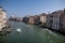 Venetian dreams: image of the Canal Grande from the Academia bridge, traditional architecture and boats. Venice, Italy