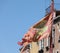 Venetian flag waving on the wind in Venice Italy