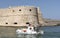 Venetian Fortress and a passing fishing boat