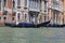 Venetian gondola on turquoise water without a gondolier without people lonely boat in Venice no one