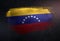 Venezuela Flag Made of Metallic Brush Paint on Grunge Dark Wall