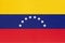 Venezuela national fabric flag textile background. Symbol of world south America country