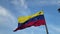 Venezuela Waving Flag Against Cloudy Sky