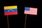 Venezuelan flag with USA flag on black