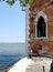 Venice. Arsenal wall with a lancet window and a view of the lagoon
