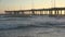 The Venice Beach Pier during high tide at sunset