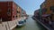 Venice, Bruno Island. Colorful houses along the canals of Bruno Island