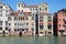 Venice buildings facades and canal in a sunny day in Italy