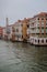 Venice canal, gondolas and Venetian houses