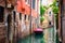 Venice canal and traditional colorful Venetian houses view. Classical Venice skyline. Venice, Italy