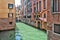 Venice canal with typical water doors