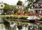 Venice Canals, cosy colorful house with boat on the 13th August, 2017 - Venice Beach, Los Angeles, California