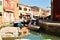 Venice city, canal, water, romantic and ancient houses, boats and tourists in Italy