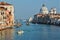 Venice city, sea, water, Santa Maria della Salute Catholic church, boat and touristic attraction in Italy