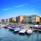 Venice cityscape, boats and traditional buildings. Grand canal.