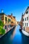 Venice cityscape, water canal, bridge and traditional buildings. Italy