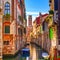 Venice cityscape, water canal, campanile church and traditional