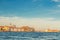 Venice cityscape with water of Giudecca canal of Venetian lagoon, embankment of Fondamenta Zattere