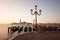 Venice classic sunrise view with gondolas on the waves