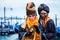 VENICE, FEBRUARY 10: An unidentified couple in typical dress poses during traditional Venice Carnival