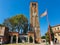 Venice flag flies next to church of santa Maria in Murano, Venice, Italy