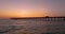 Venice, Florida. Seaside summer activities. Many tourists enjoying sunset on fishing pier