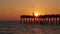 Venice, Florida. Seaside summer activities. Many tourists enjoying sunset on fishing pier