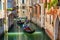 Venice, gondolas sailing along narrow canals, popular tourist attraction