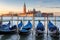 Venice gondolas at sunrise on San Marco square