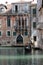 Venice Gondolier in a traditional venetian canal