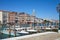 Venice, Grand Canal view with motorboats taxi, Saint Mark bell tower in Italy