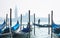 VENICE, ITALY - 02.23.2019: Venice Panorama with nice gondolas. Cityscape image of Venice, Italy and waterfront Saint Mark square