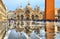 VENICE,ITALY 10.11.2016 St Mark`s Square full of tourists during a flood with beautiful water reflections of St. Marks Cathedral