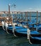Venice, Italy. Amazing views of the Grand canal in the morning. Gondolas at the pier.