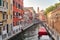 Venice, Italy. Ancient houses, moored boats along the canal