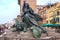 Venice, Italy - April 27, 2017: Metal statue of a girl on the ba