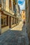 VENICE, ITALY - August 02, 2019: Narrow pedestrian streets of Venice bitween the channels. Some quiet places almost without people