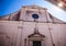 VENICE, ITALY - AUGUST 20, 2016: Famous architectural monuments and religion signs of old church wall medieval buildings close-up