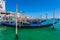 Venice, Italy - August 31, 2013. Gondola docked at the pier in V