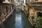 Venice Italy Canal with Bridge and Trattoria