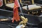 Venice, Italy - Closeup of a Venetian gondola in the rain with flag and coat of arms of the city of Venice, the