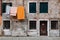 Venice, Italy - February 19 , 2020: Laundry hanging out of a typical Venetian facade. Italy.