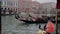 Venice, Italy - February 23, 2017: Grand Canal side view with vaporetto and boats passing, foggy day, Canal grande, Venice, Italy.
