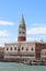 Venice, Italy - July 14, 2016: Italian scenes adn Saint Mark Bell tower and Ducal Palace