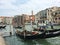 Venice, Italy - July 3, 2018: gondoliers conduct tours of the historical sites